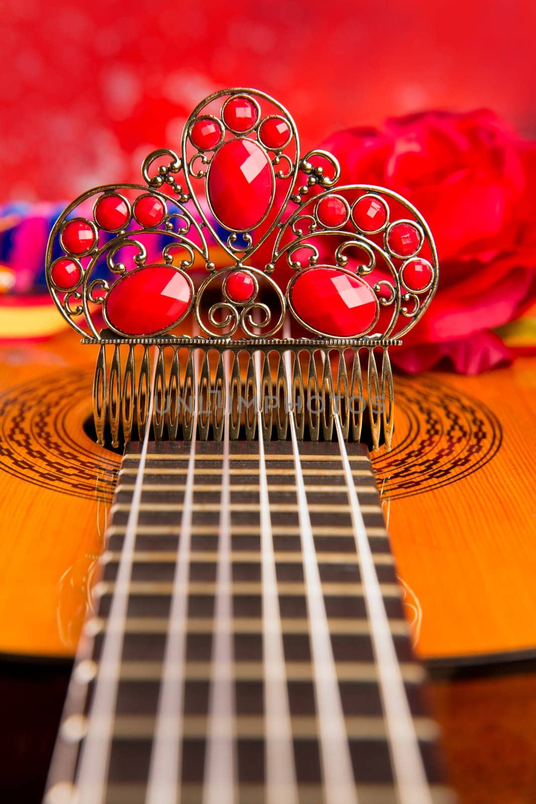 Classic spanish guitar with flamenco elements as dancer comb