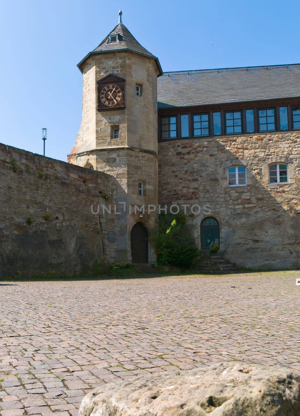 Courtyard of the castle Waldeck Edersse overlooking the tower with clock tower.