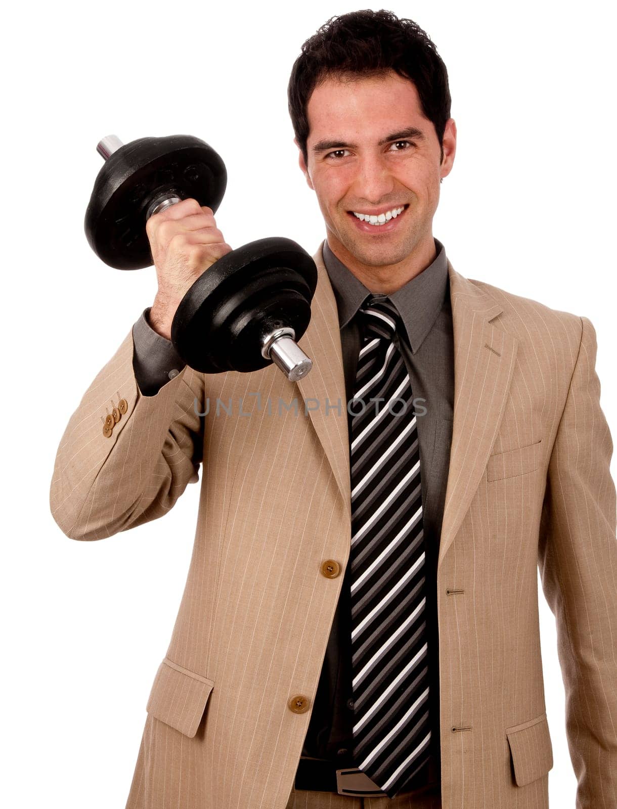 Young male businessman in light suit with power lifts a dumbbell and shows strength and determination, isolated against white background