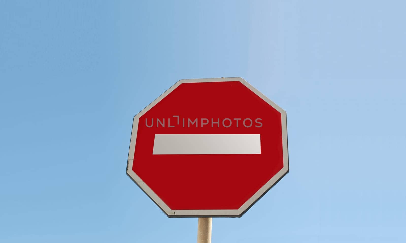 forbidden signas with a blue sky as background