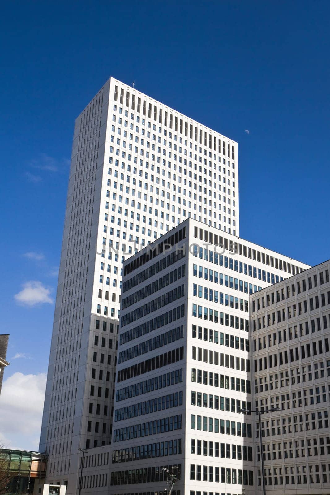 High buildings of Erasmus Medical Centre Rotterdam the Netherlands with blue sky and moon - vertical