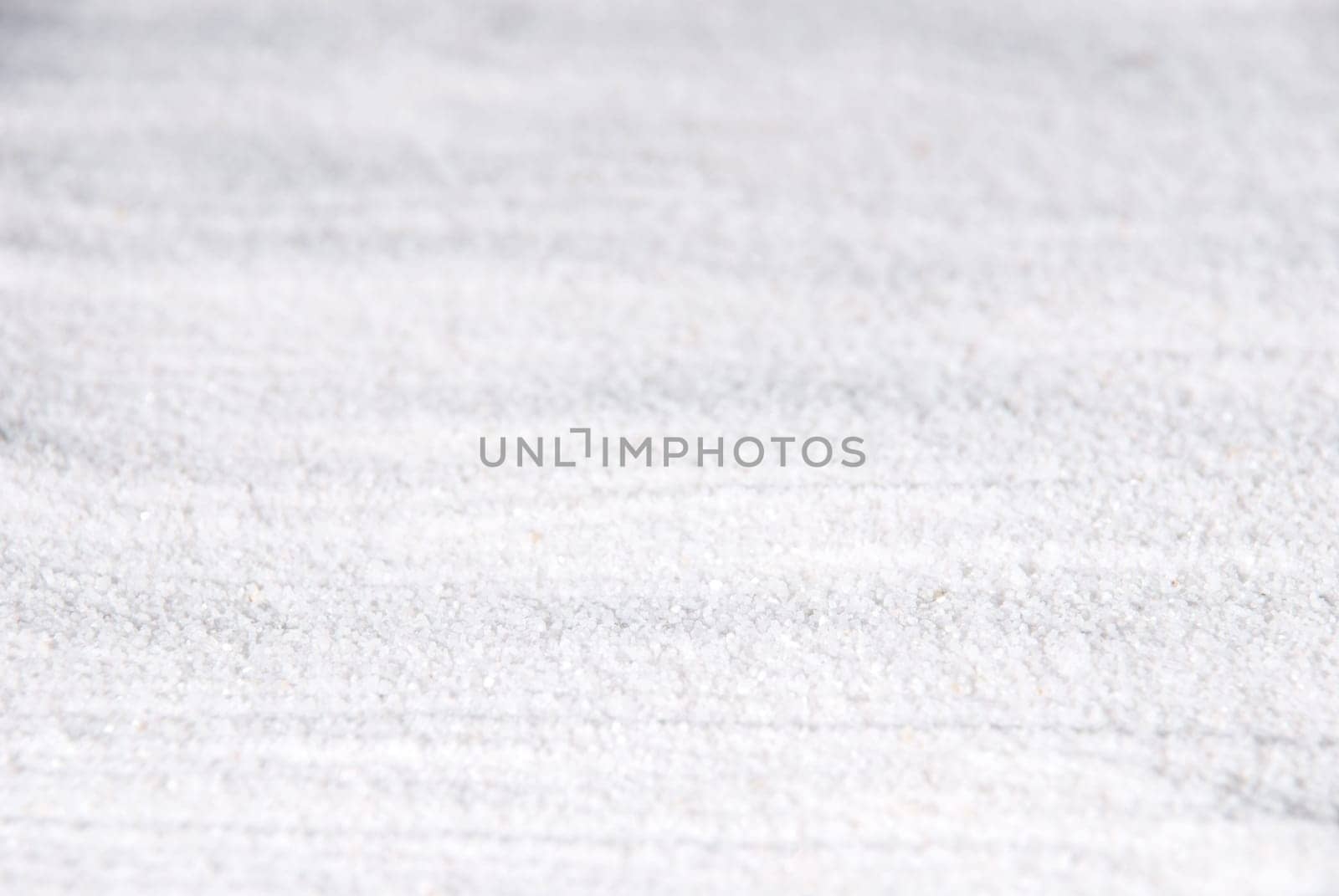a background or texture with white sand
