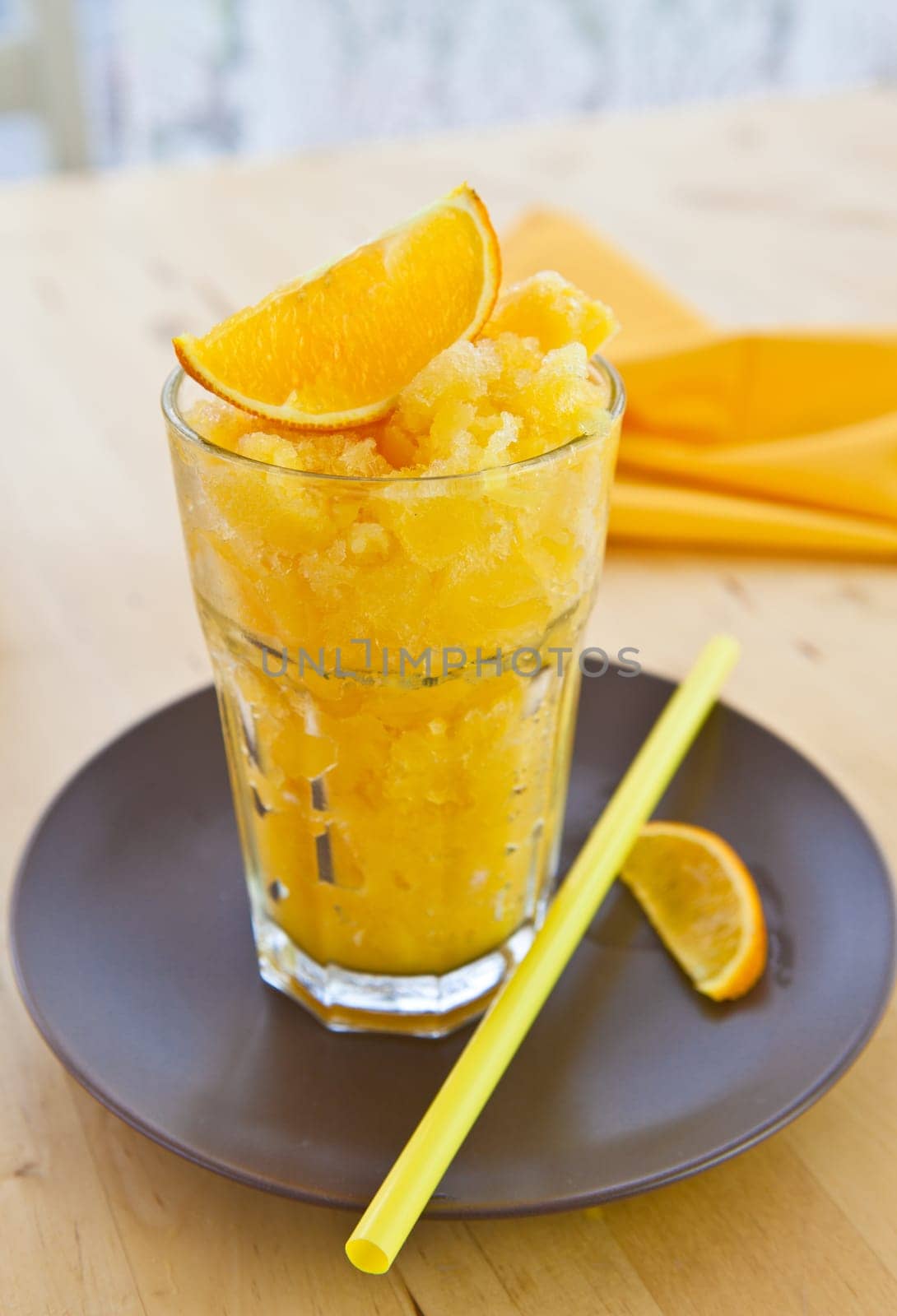 Homemade Orange Granita in a tall glass
