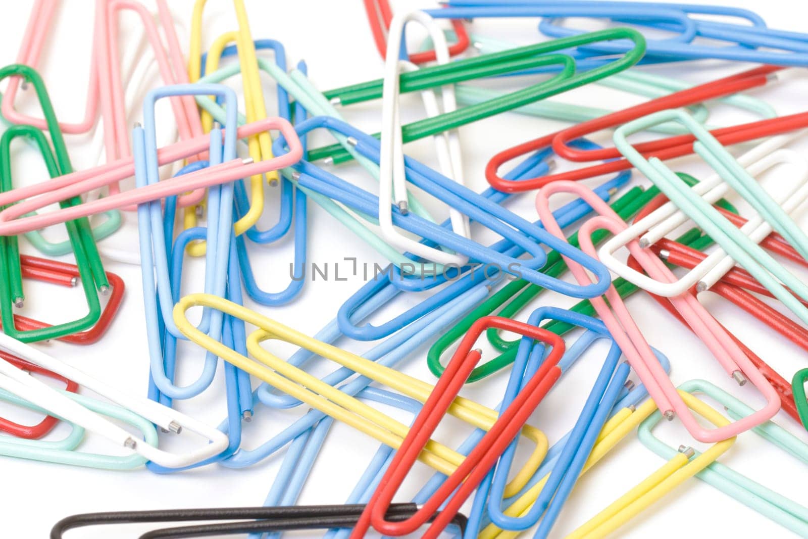 Paper clips closeup on white