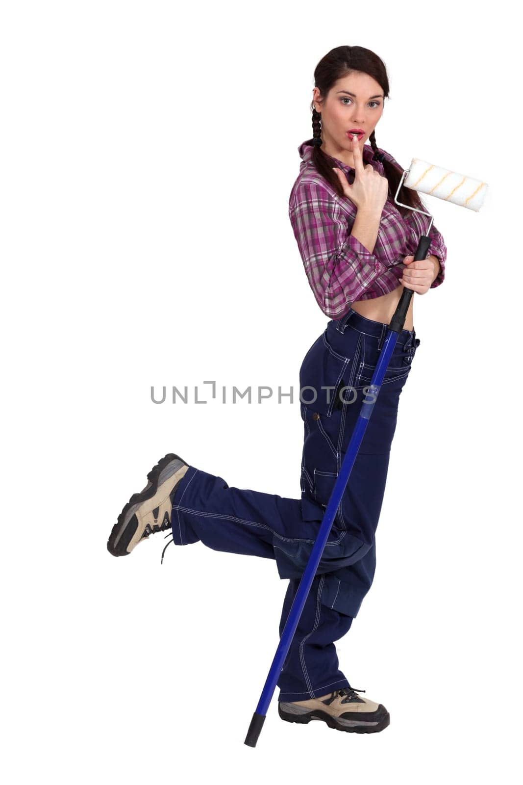 Woman with a long paint roller