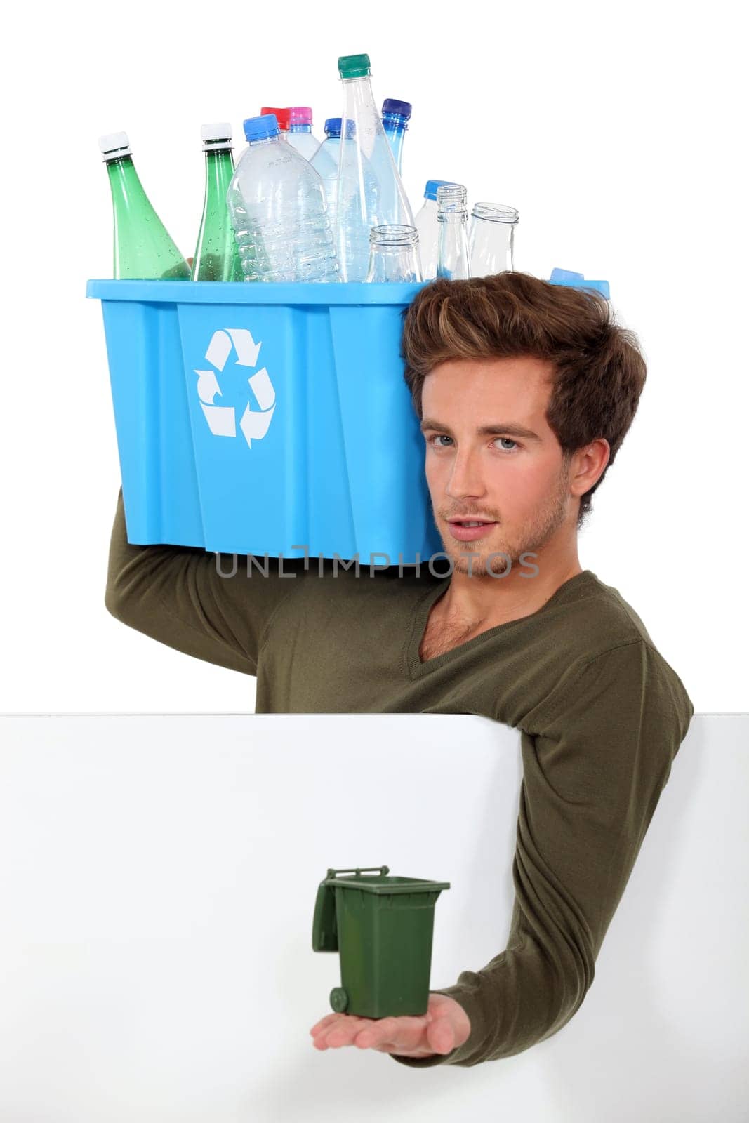 Man with empty bottles and containers