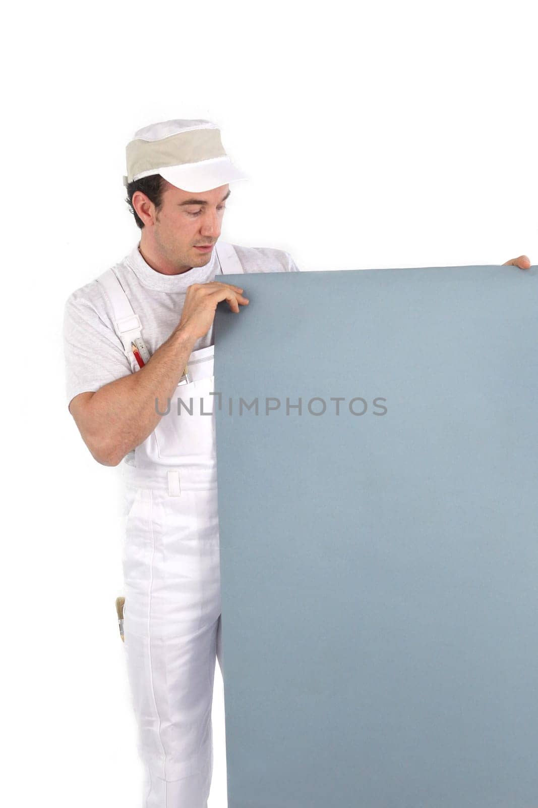 Painter holding a board