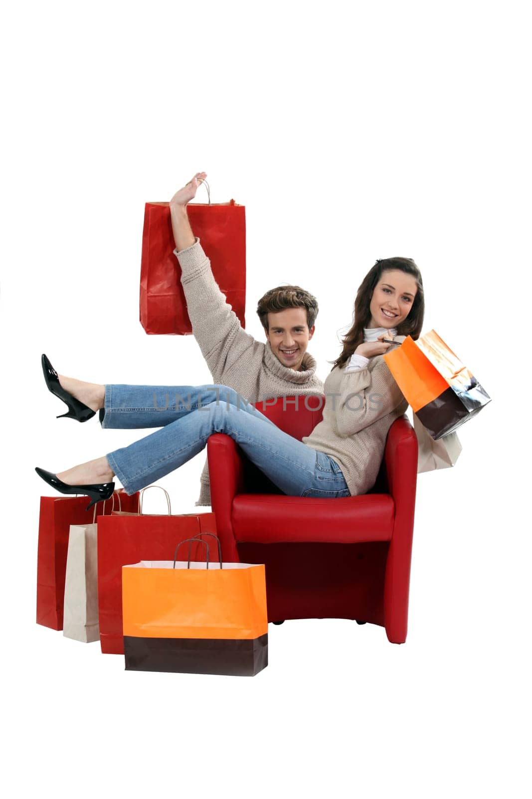 Couple posing with their shopping bags
