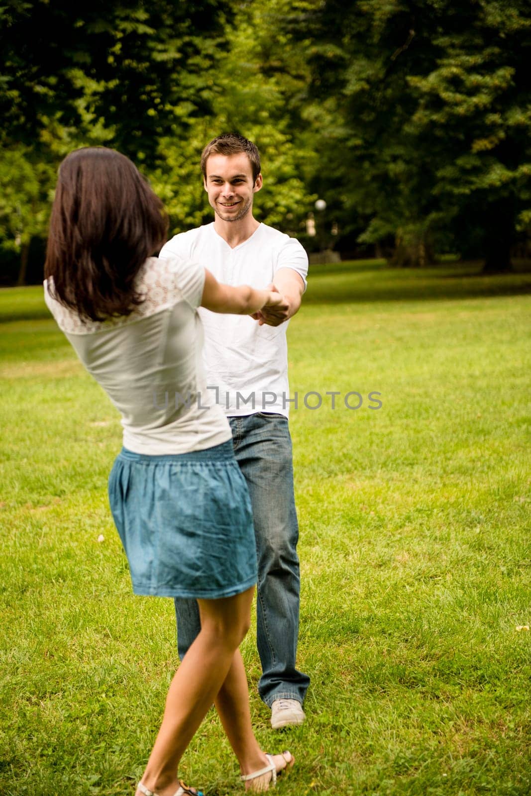 Young happy couple enjoying life together - outdoor youth lifestyle