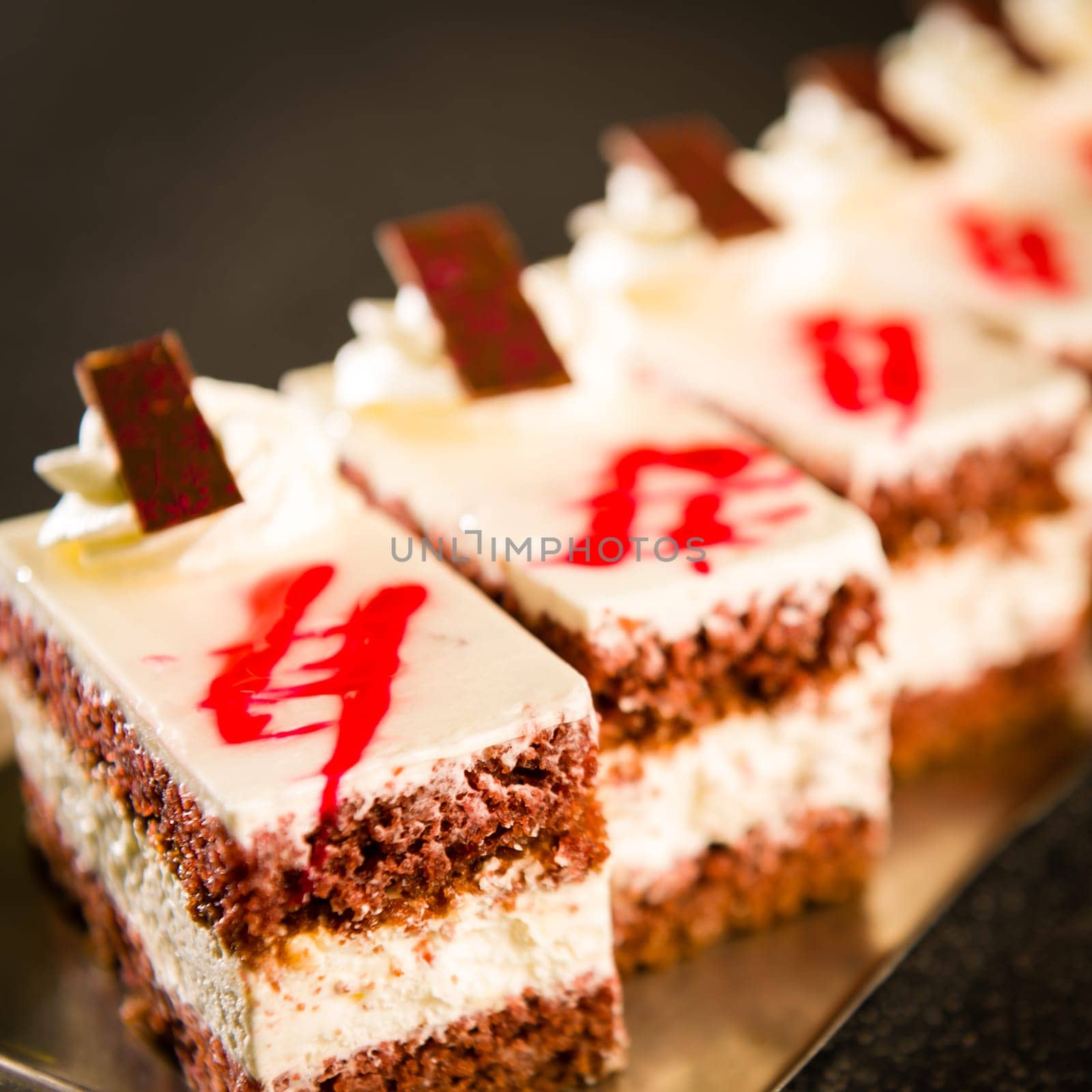 Tastefully arranged creamy sponge cakes filled with custard