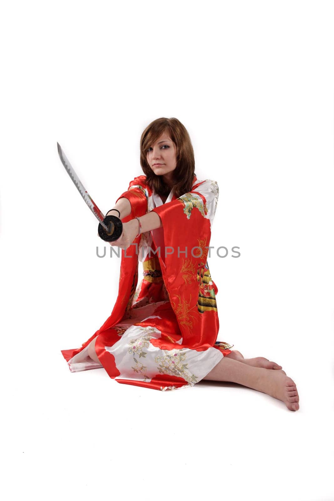 french young girl geisha in red silk kimono with japanese sword