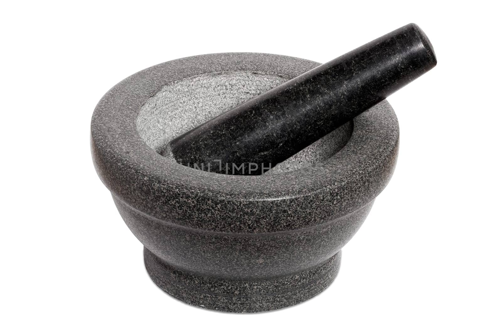 Heavy granite mortar insulated against a white background