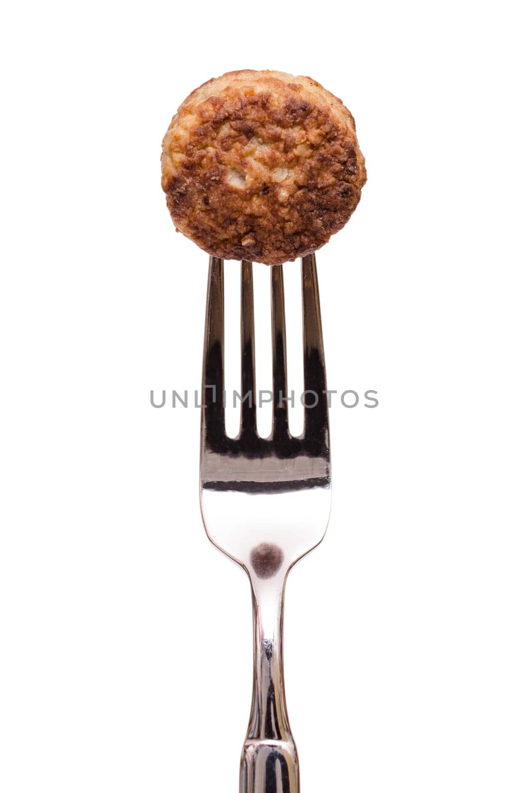 White cut-off meatball on a fork