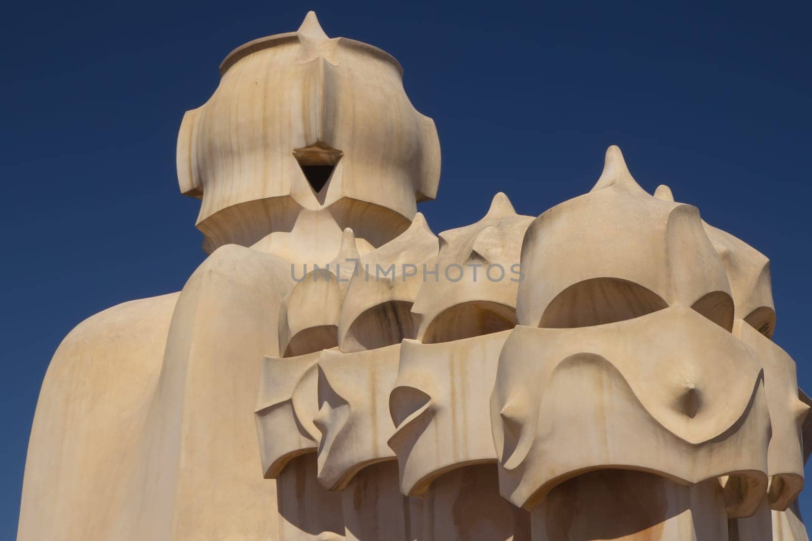BARCELONA. APR 24: Casa Mila. On the rooftop there are twenty-eight chimneys in several groupings  twisted so that the smoke came out better.  2013 in Barcelona, Spain.
