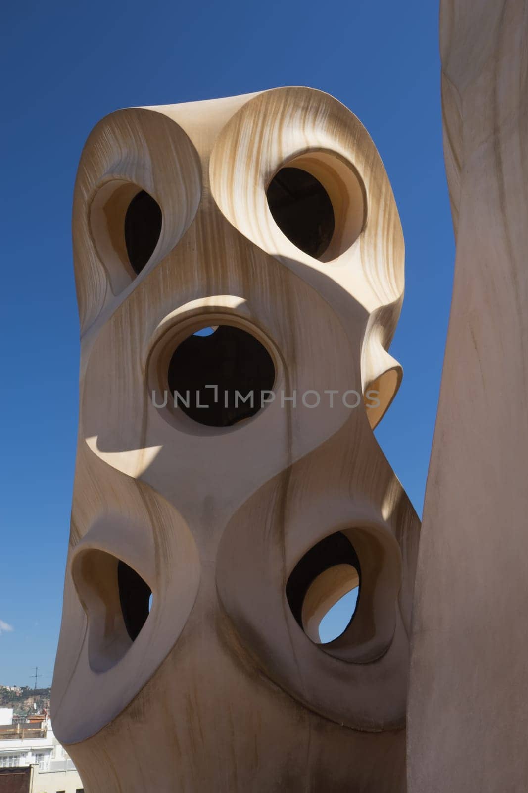 BARCELONA. APR 24: Casa Mila. On the rooftop there are twenty-eight chimneys in several groupings  twisted so that the smoke came out better.  2013 in Barcelona, Spain.