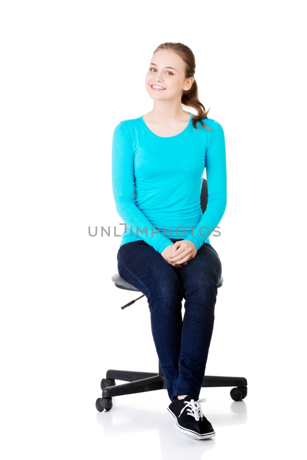 young happy student woman or businesswoman sitting on a wheel chair,isolated over a white background