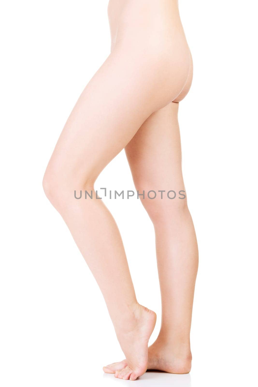 long pretty woman legs isolated on white
