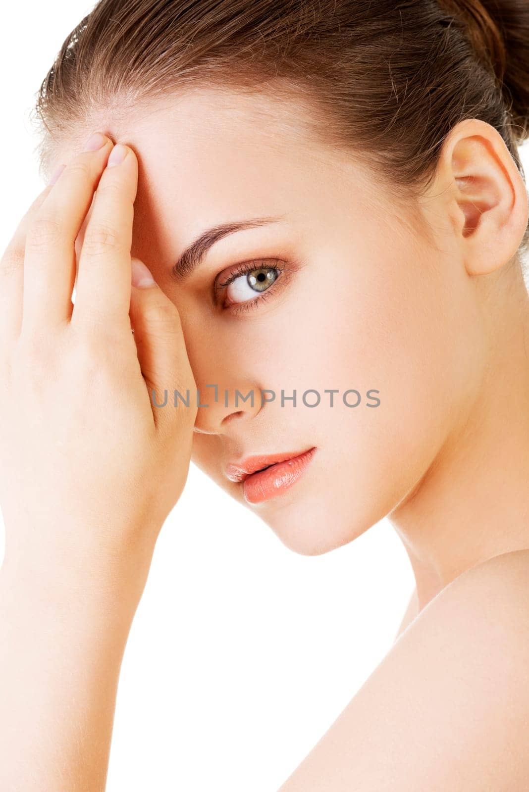 beautiful woman's face with fresh clean skin - isolated on white background