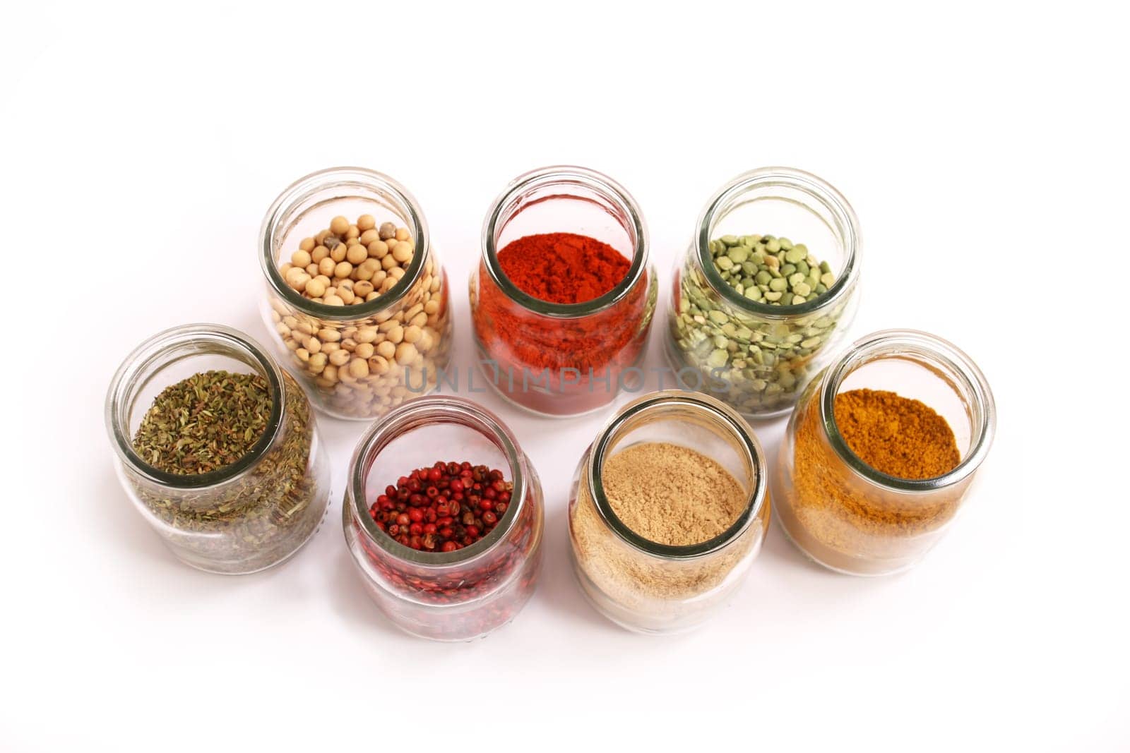 Variety of spices in a glass pot.