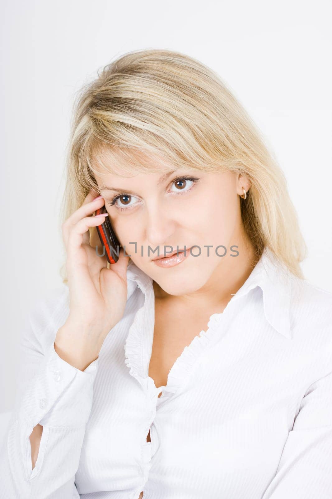 nice blonde girl talking on a cell phone