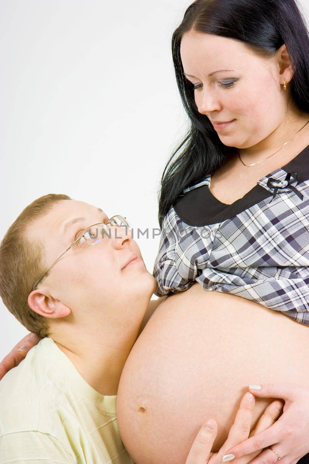young family in anticipation of the birth of the child