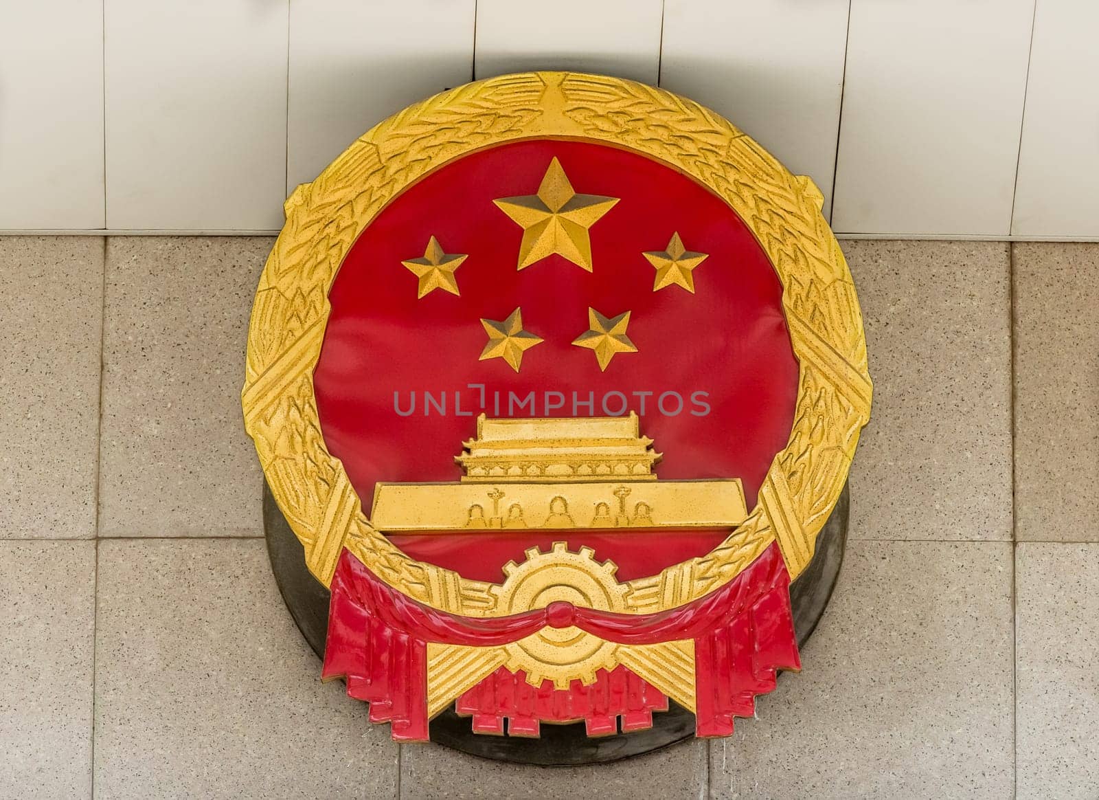 Chinese Political Party Emblem in front of official building in shanghai popular republic of china