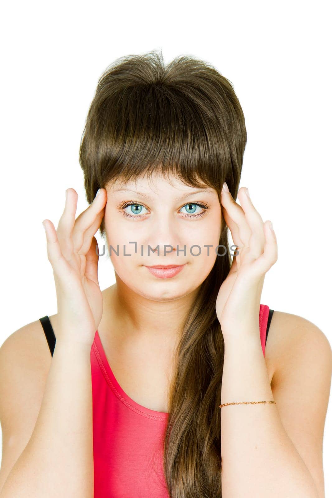on an isolated white background portrait of a beautiful girl with a headache