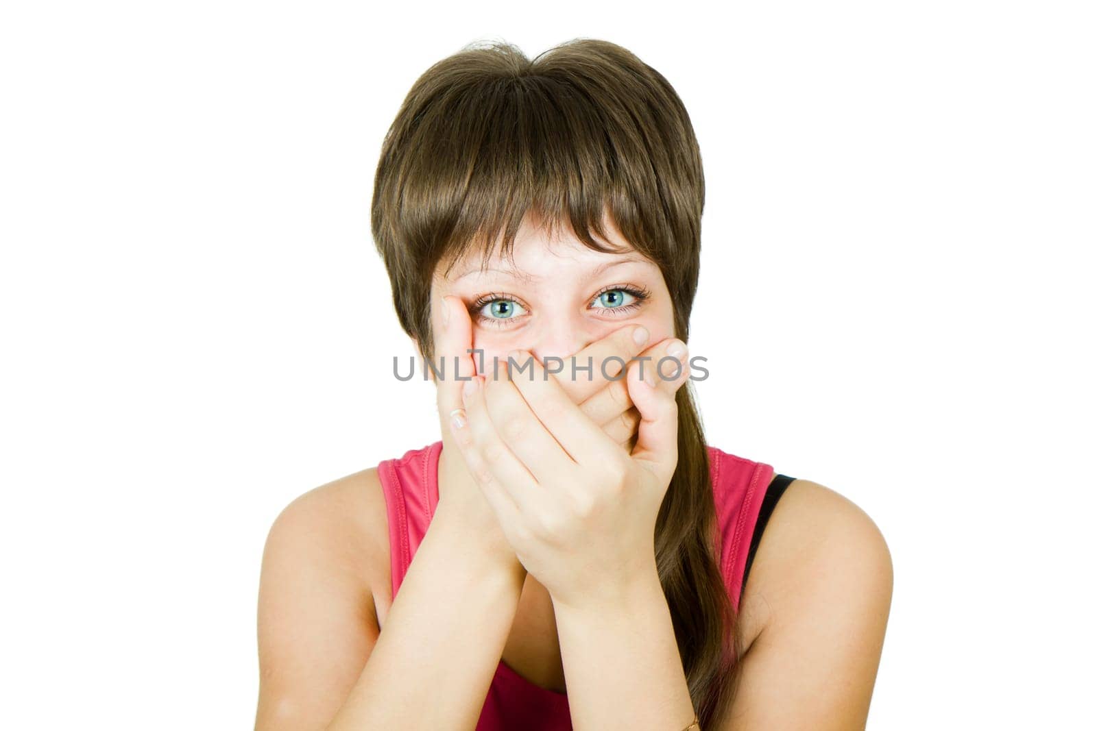 she closes her mouth with her hands on an isolated white background