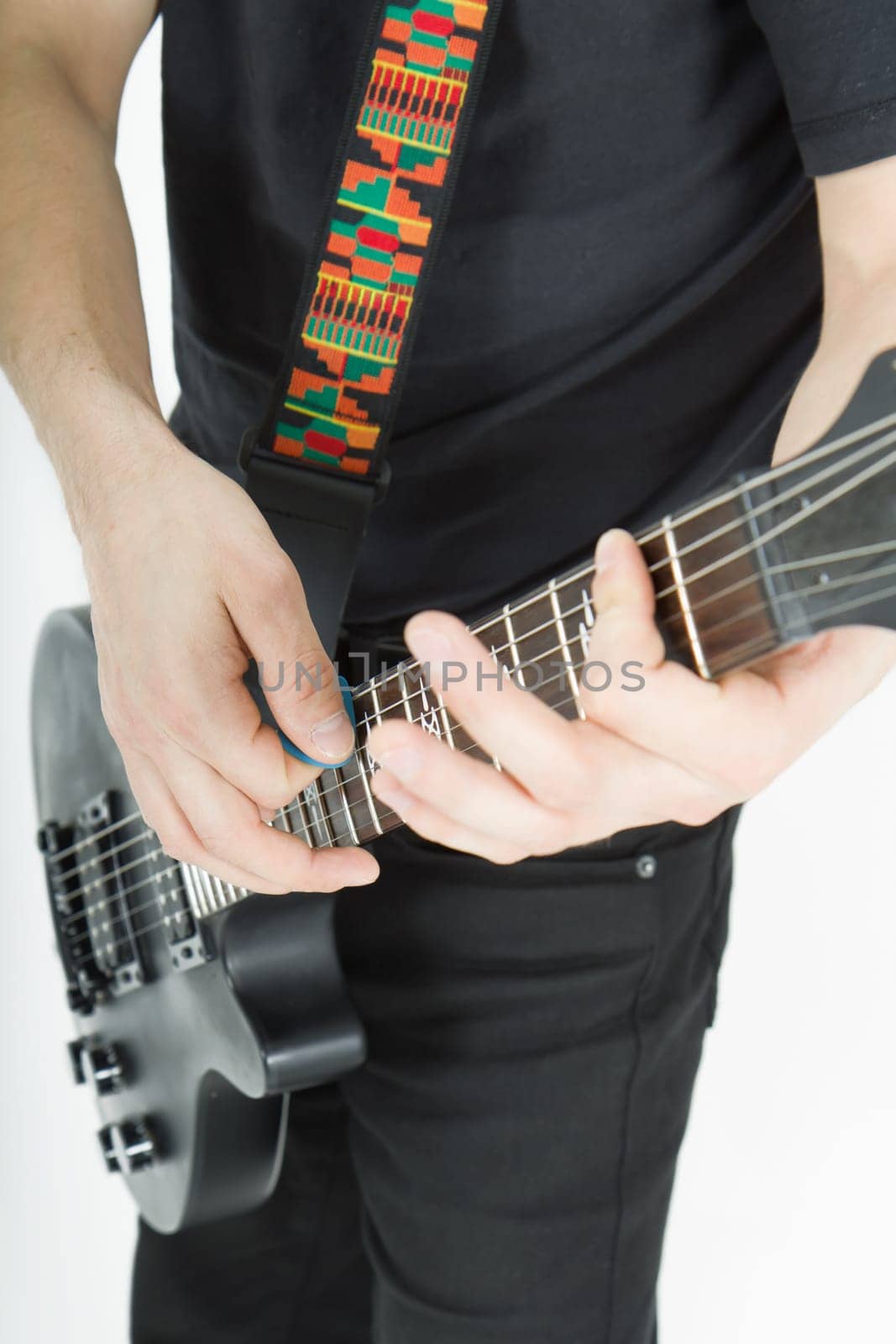 guitar in the hands of a musician
