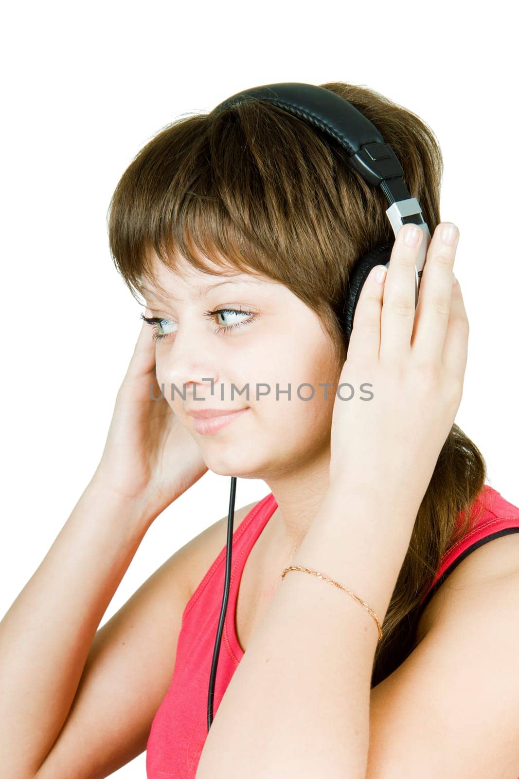 beautiful smiling girl teenager in the headphones