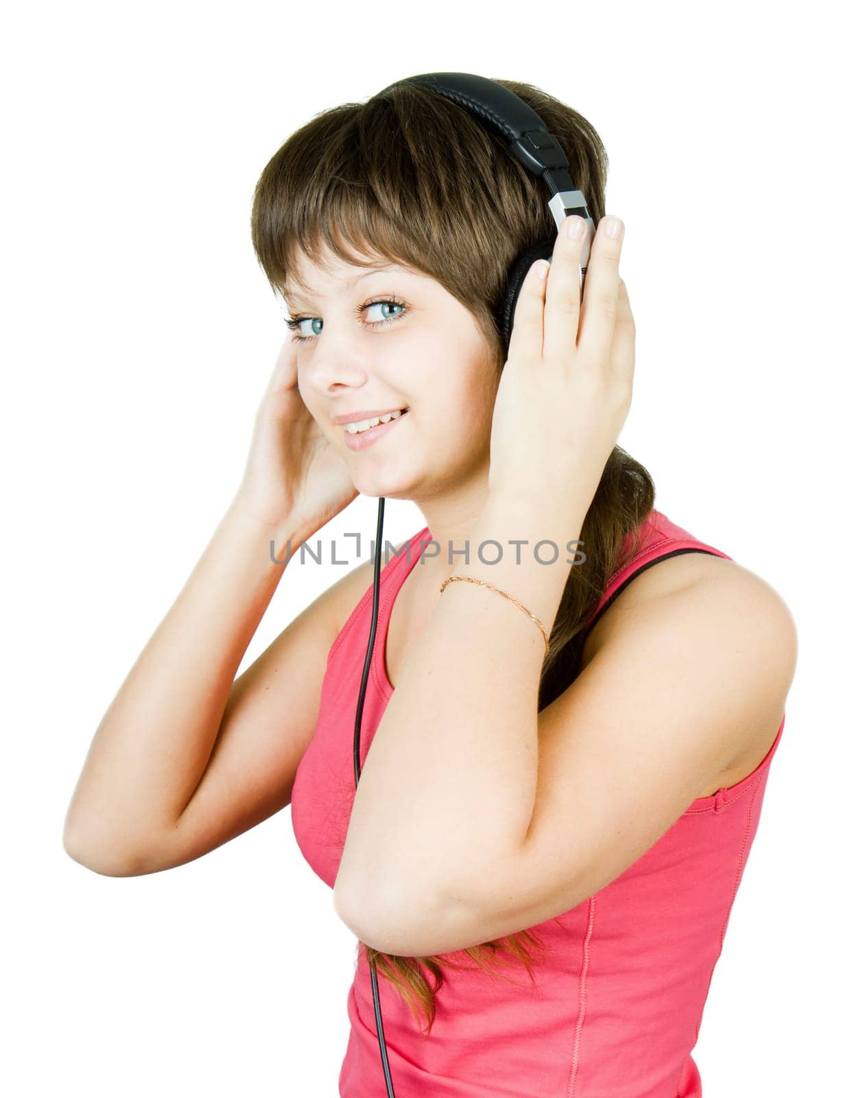 beautiful smiling girl teenager in the headphones