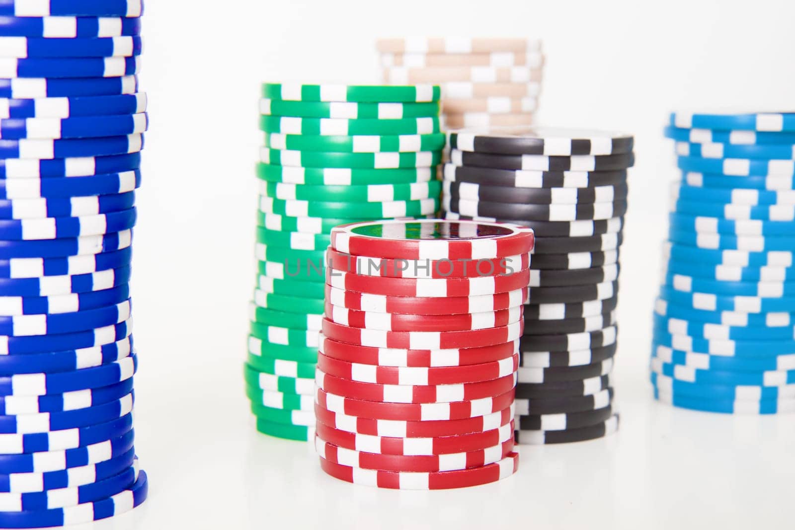 stack of poker chips on a white background