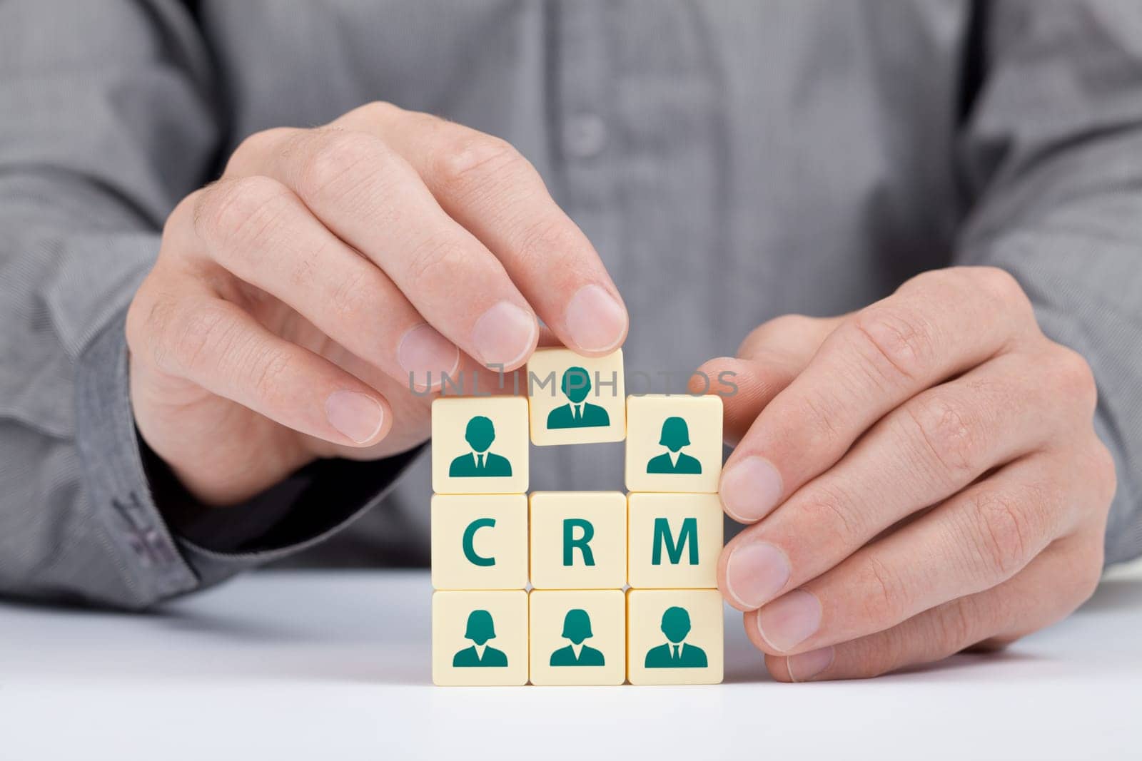 CRM (customer relationship management) concept. Businessman add new customer in database.