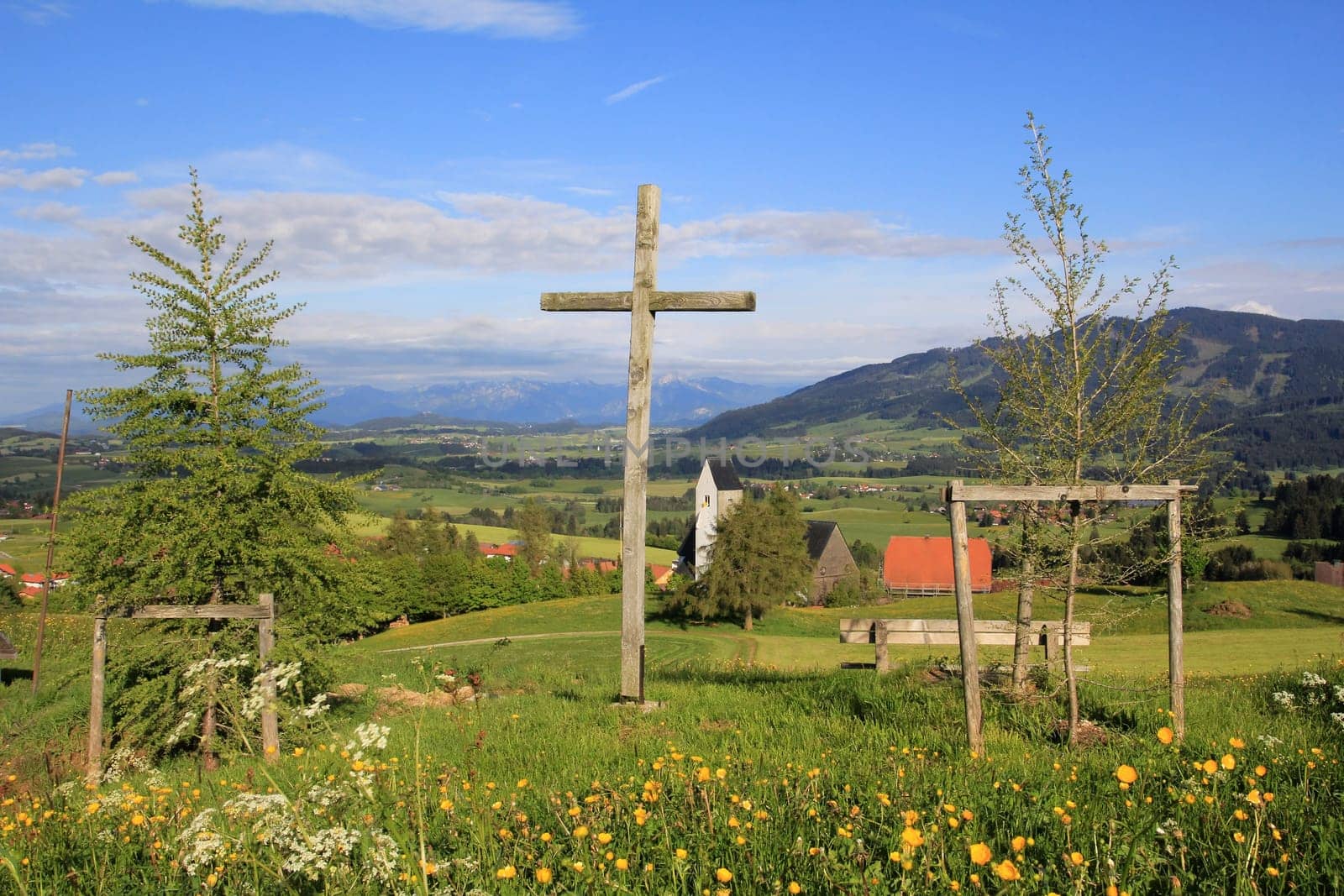The cross in front of the Mittelberg church in the Allgäu