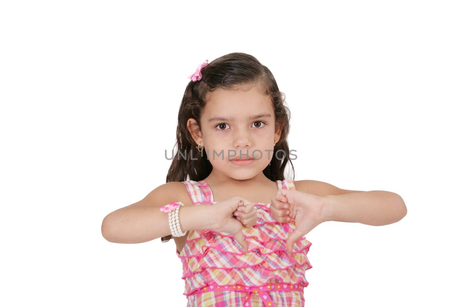 Pretty little girl hand gesturing thumb down failure sign