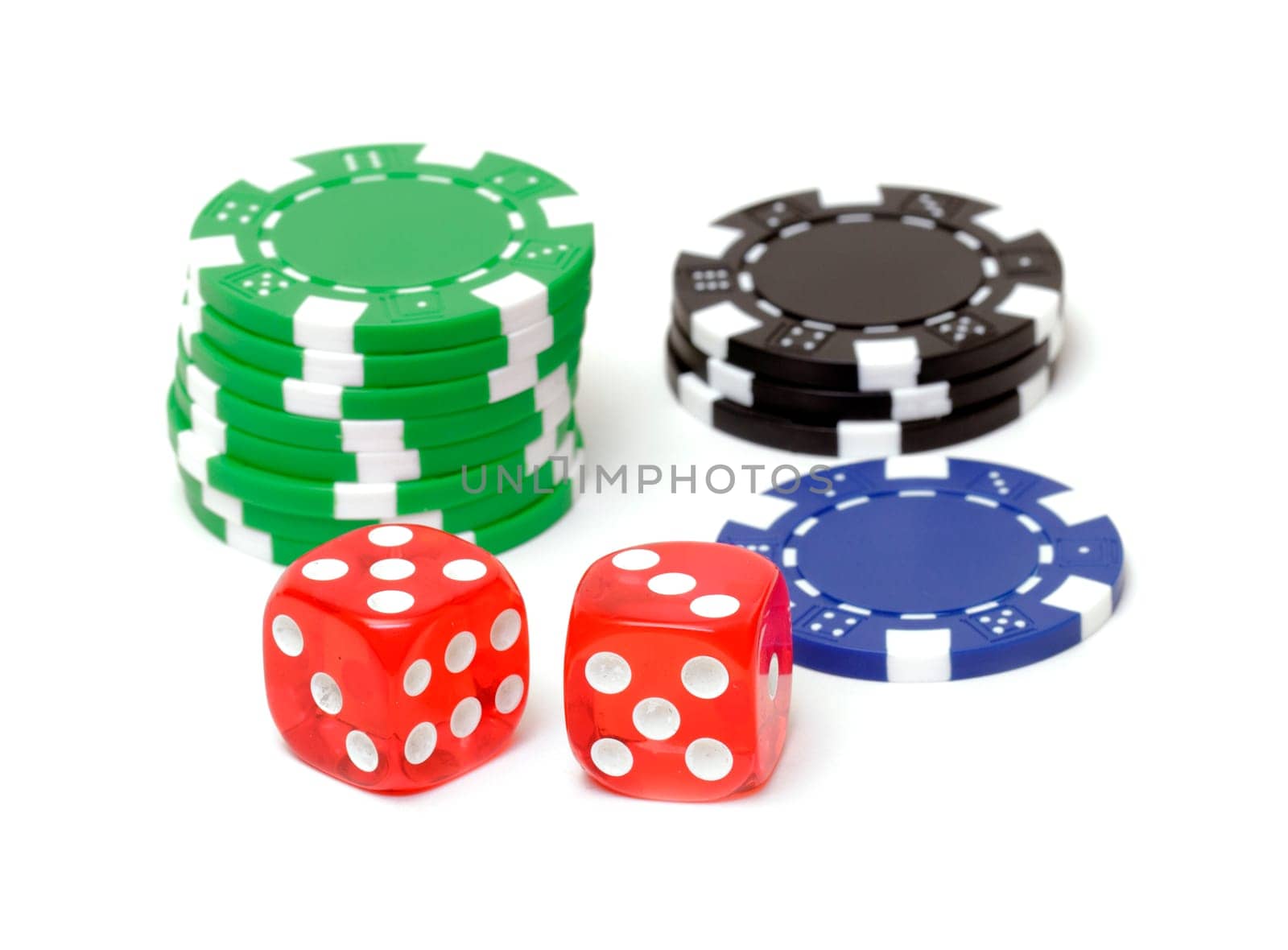 Poker chips and dices on white