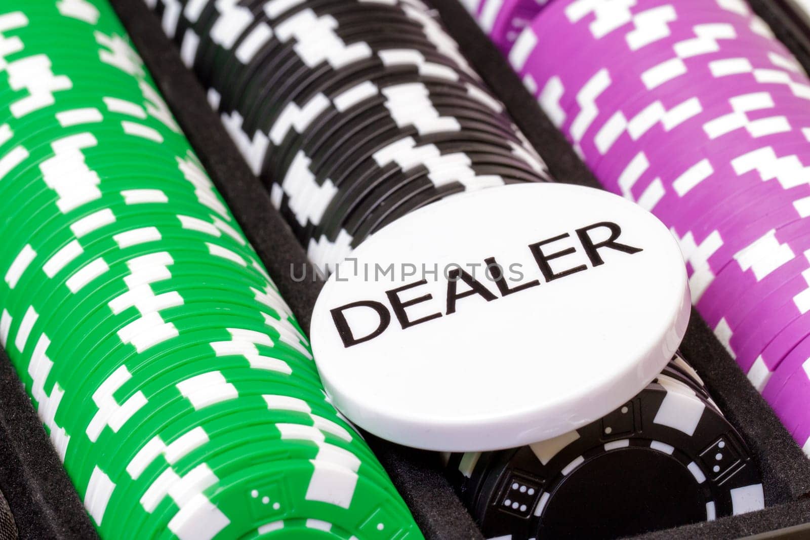 Set of poker chips and dealer button, closeup