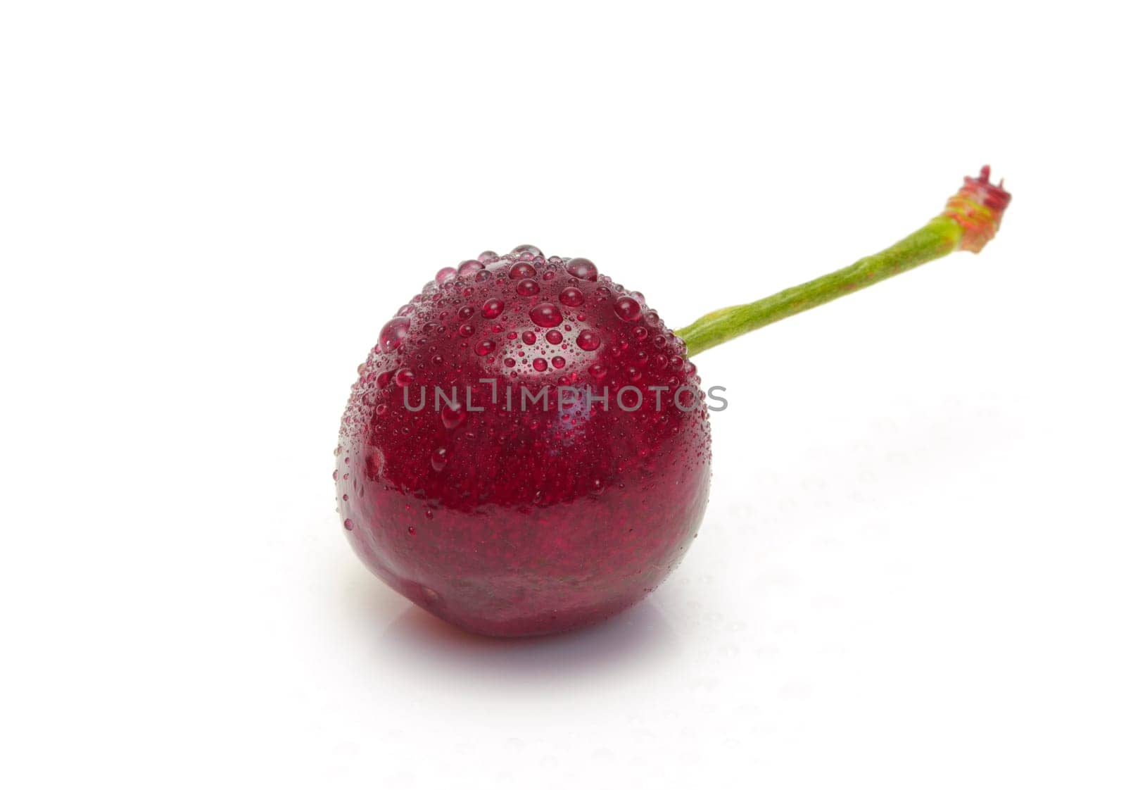 Ripe cherry on white background