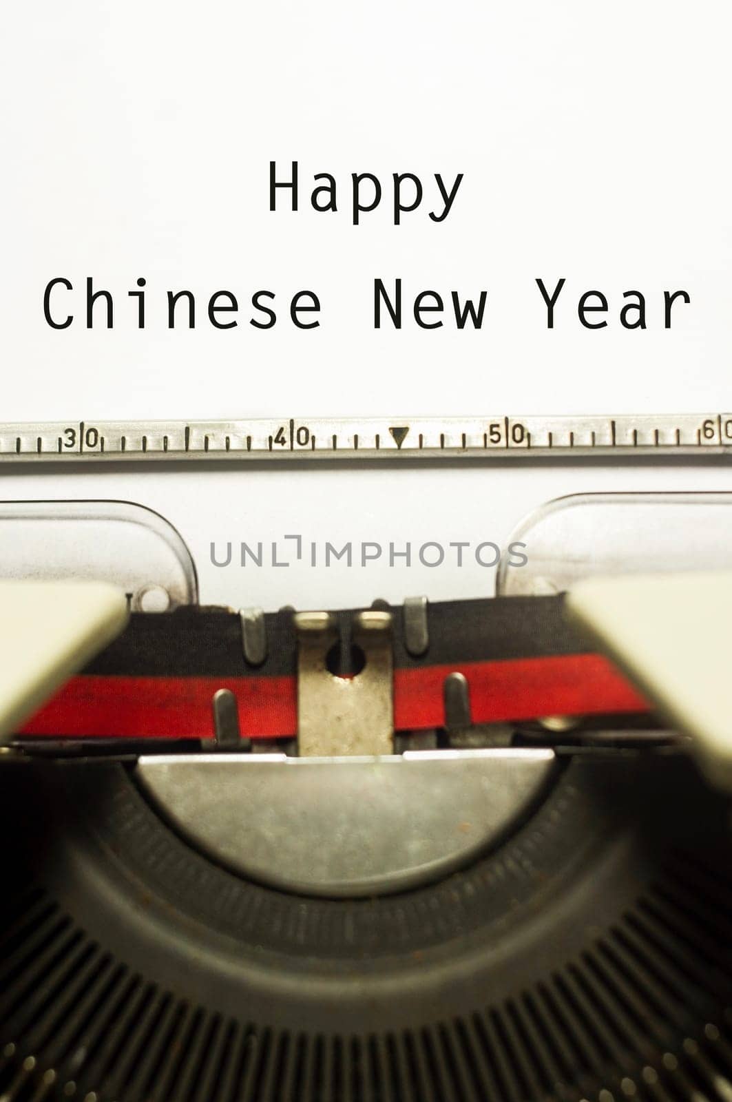a close up of typewriter, focus on paper where message will be typed.