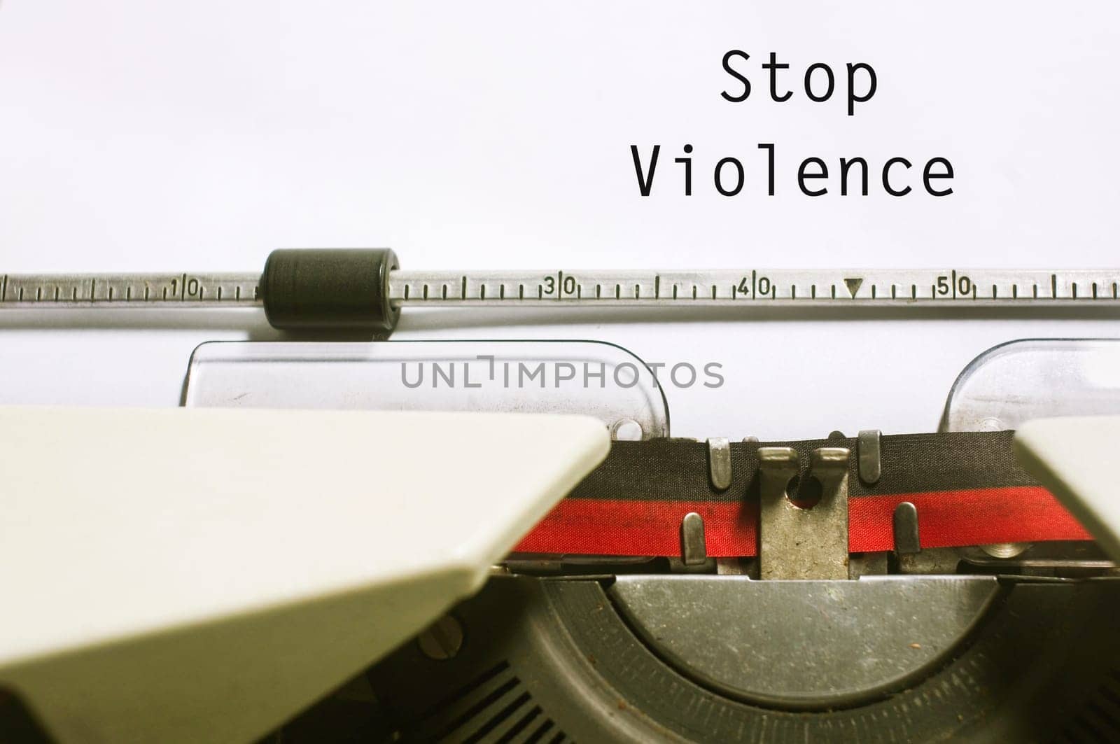 stop violence concept, with message on typewriter paper.