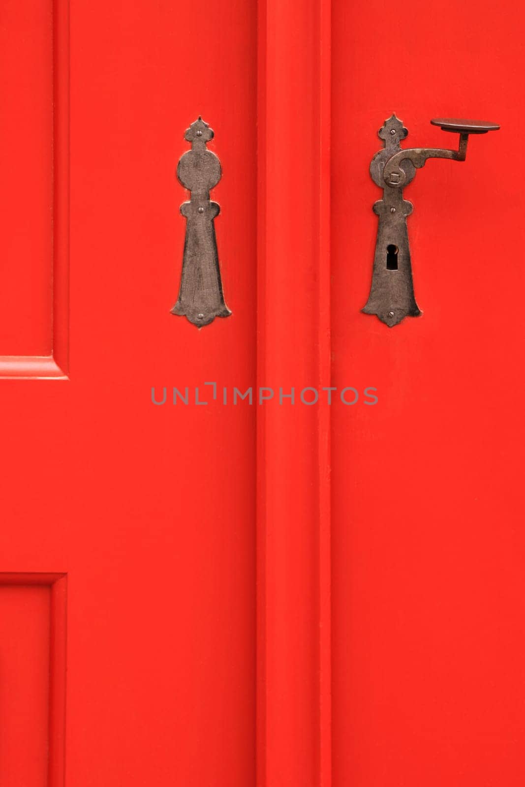 Red door with metal handle, retro style
