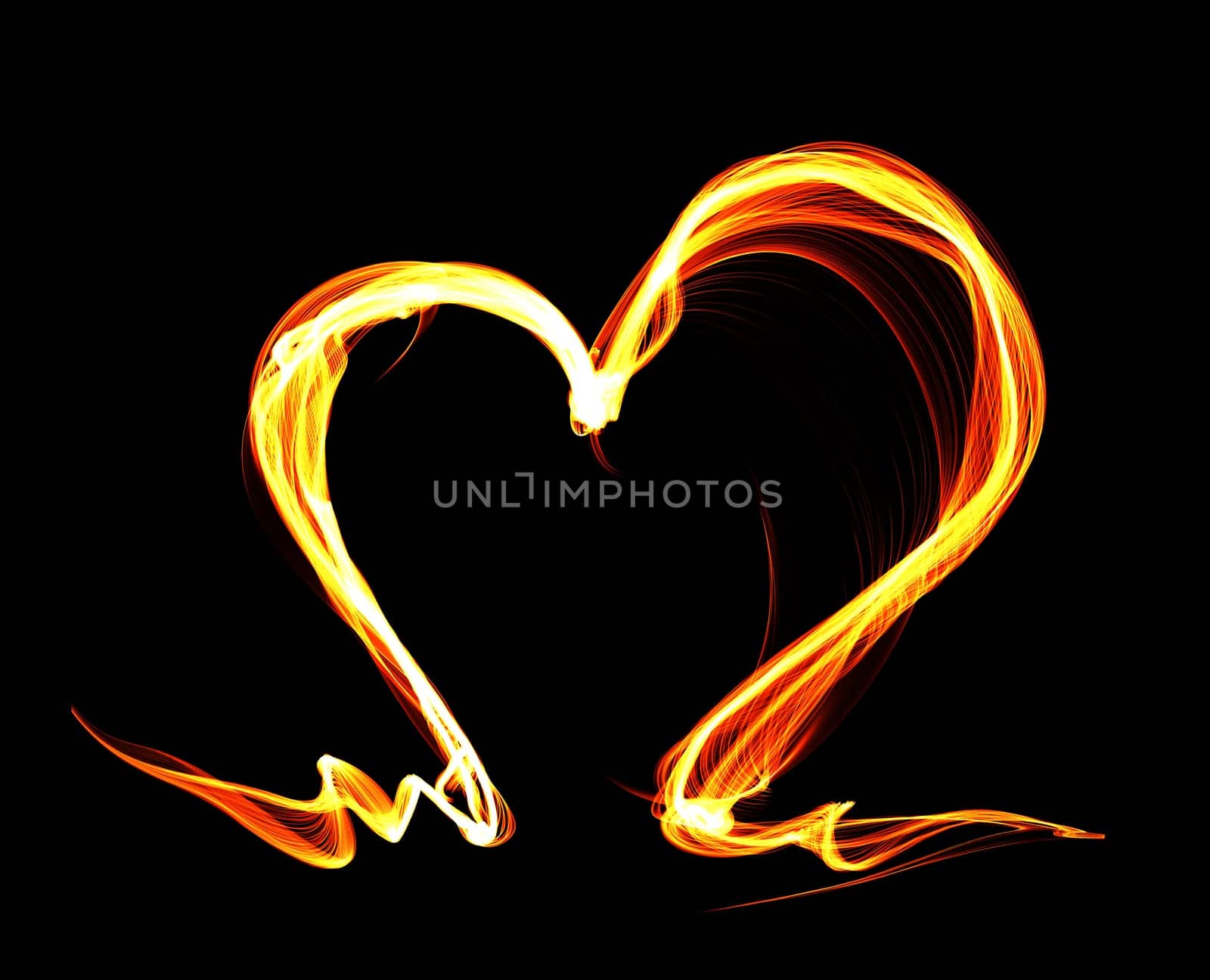 Orange fire heart isolated on black background