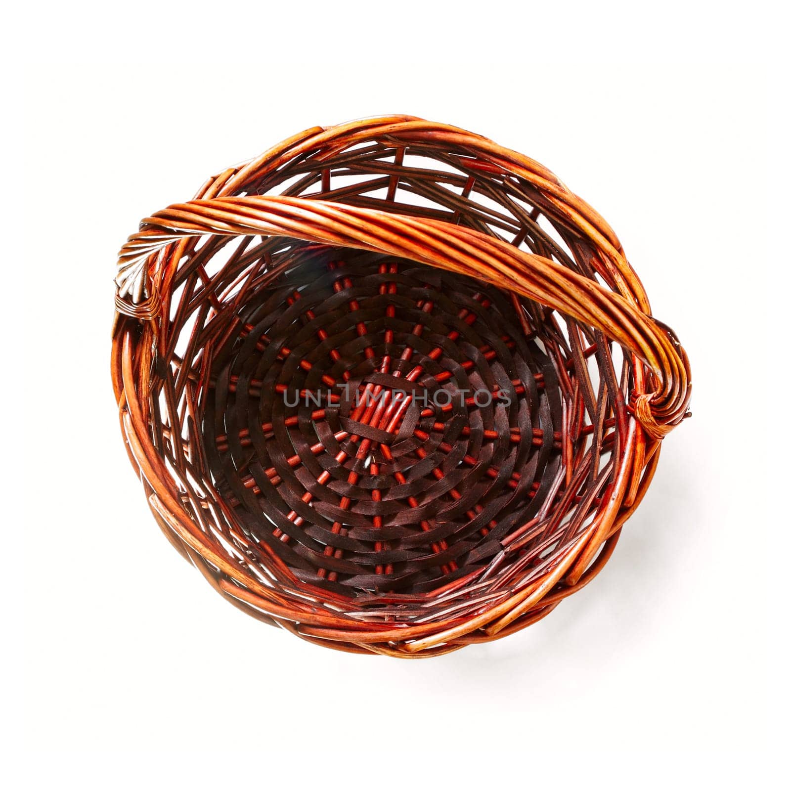 Handmade rattan basket on white background. Top view
