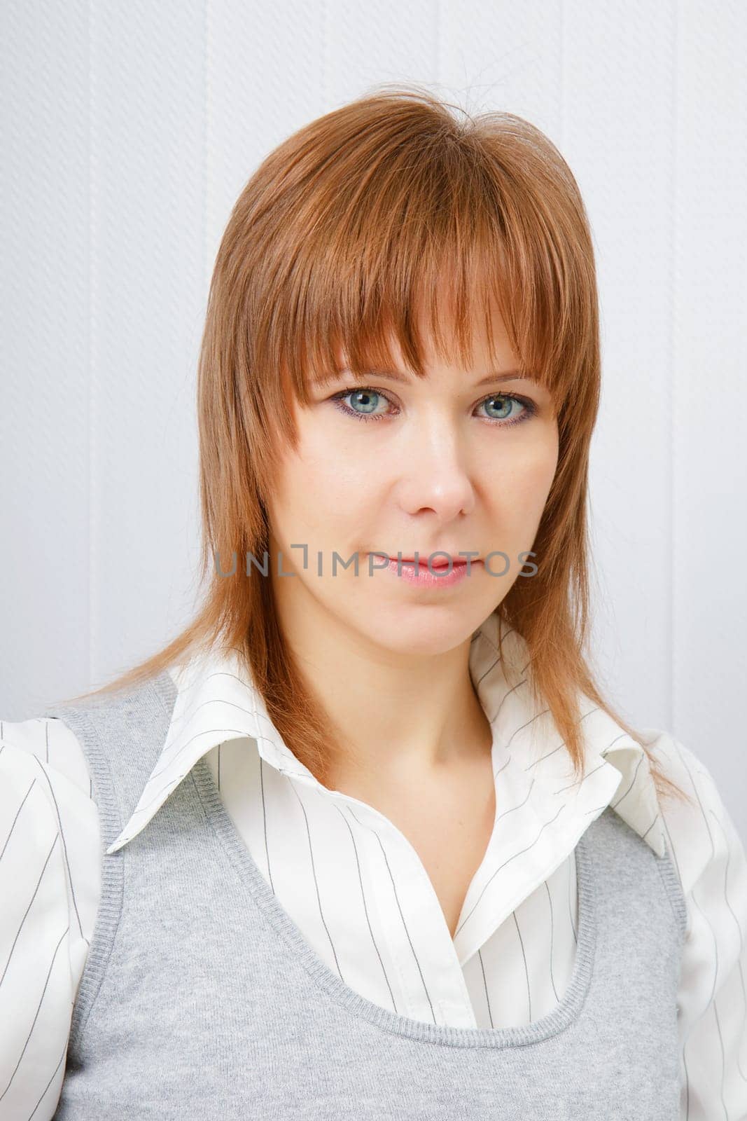 Portrait of an attractive young business woman in office