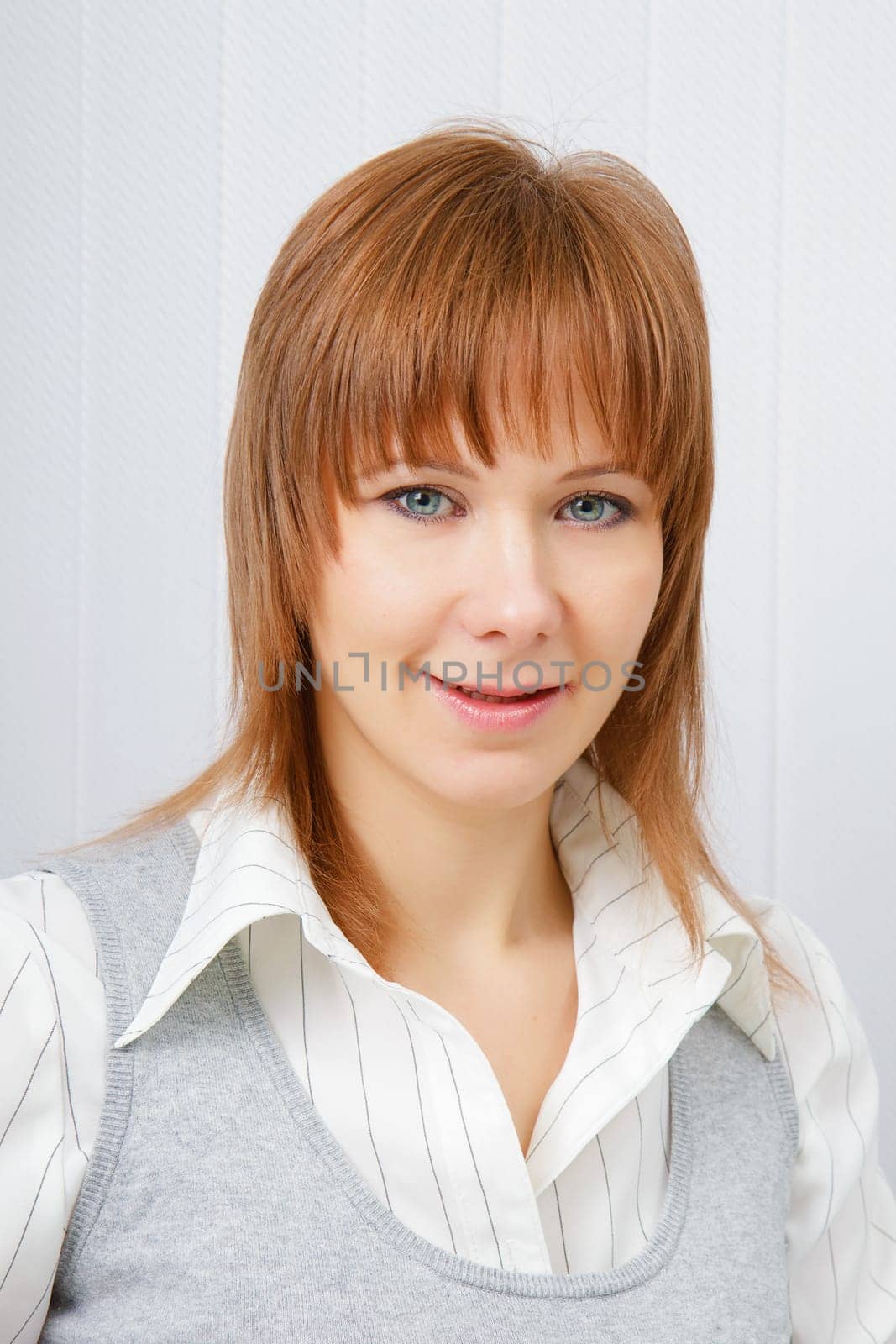 Portrait of an attractive young business woman in office