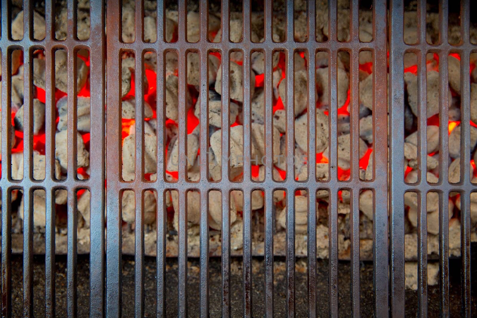 barbecue embers glowing in red fire