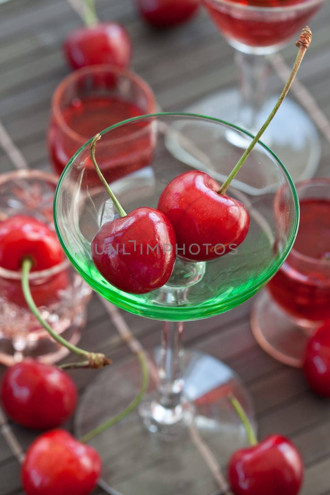 Fresh cherries in a small jar