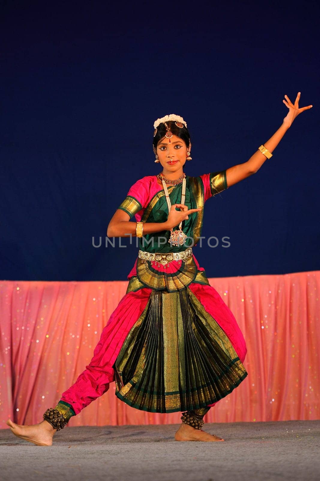 CHENNAI - JAN 7: Indian classical dance performed by an unknown artist during mylapore festival Jan 07, 2012 in Chennai, India