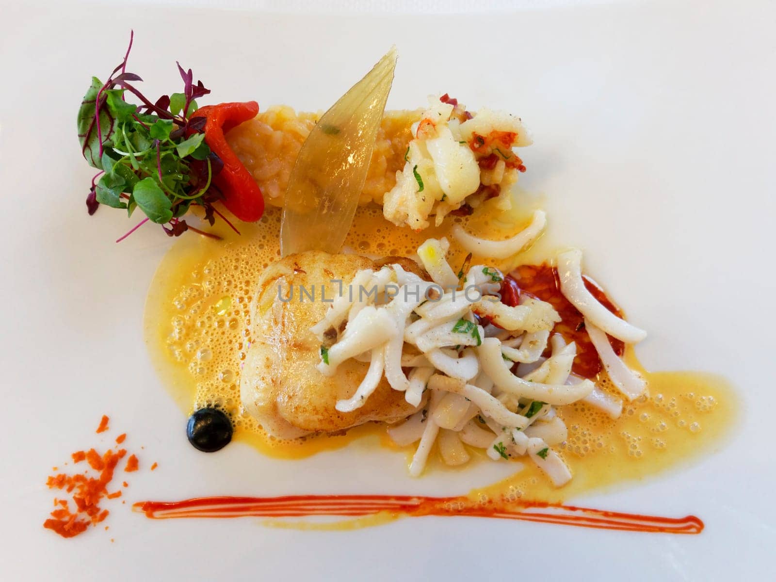 Fish main course on a white plate