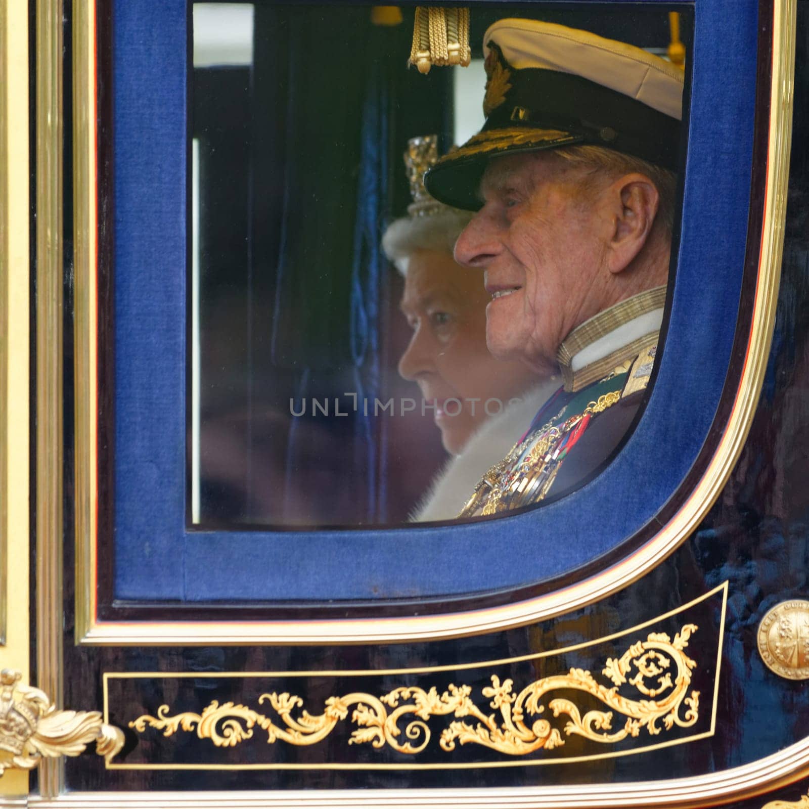 London, UK. May 8th, 2013. Queen Elizabeth II and Prince Philip leaving Buckingham Palace and going to the State Opening of Parliament.